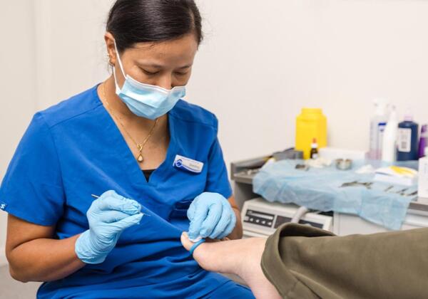 Prosper Health Group practitioner treating an ingrown toenail on patient at Highton clinic